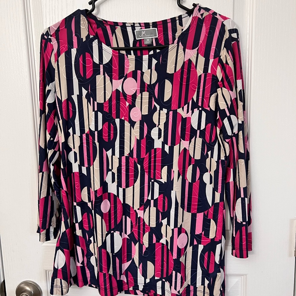 Woman’s casual top /Blouse. Slim fit and soft material .